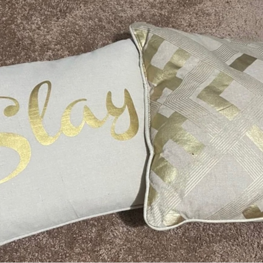 Gold and tan throw pillows- Slay and cross check pattern